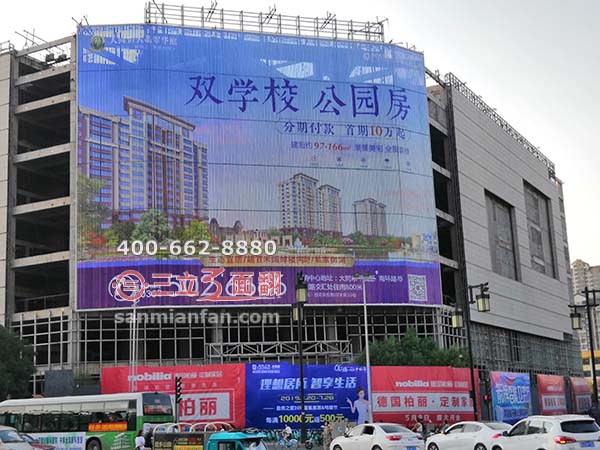 山西大同超高六層分段大型三面翻廣告牌案例施工圖片