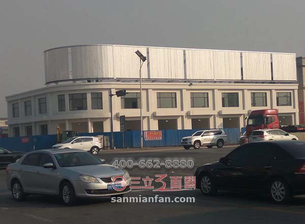 天津市靜海區(qū)大邱莊樓頂弧形三面翻廣告牌案例施工圖片